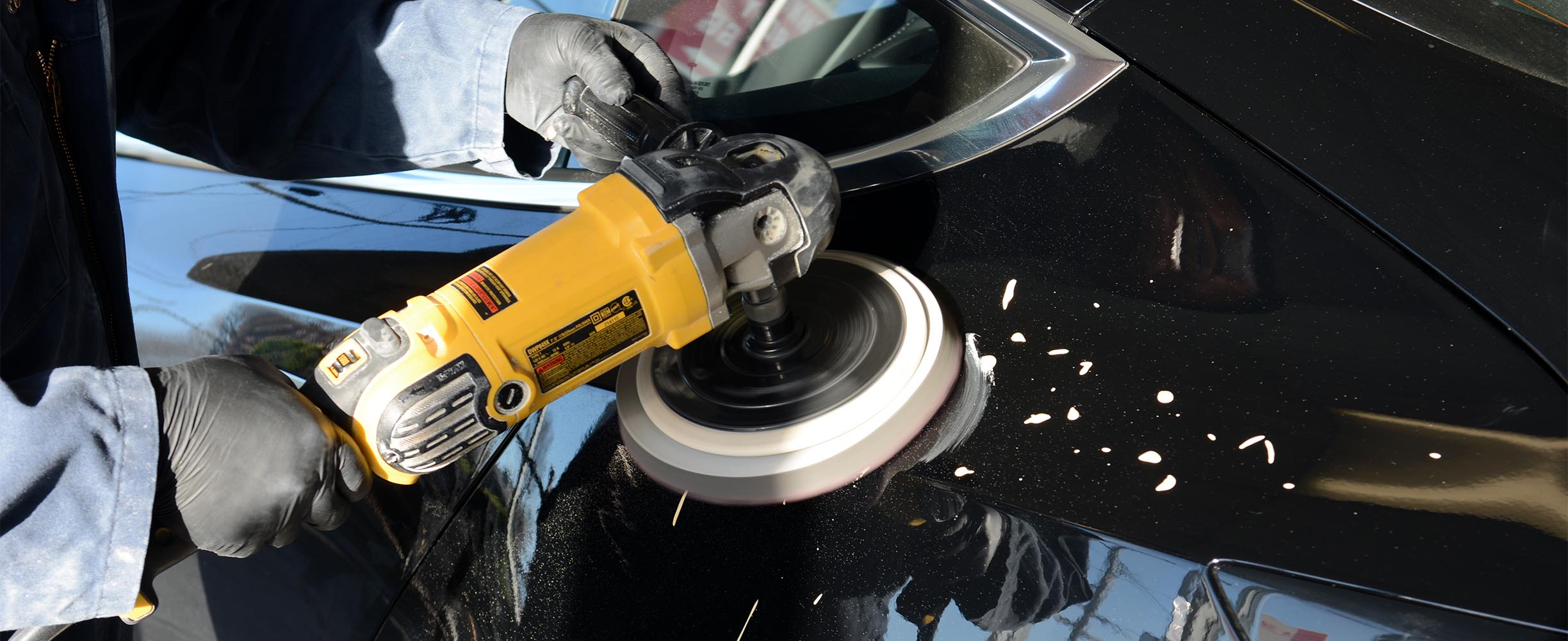 Professional automotive paint polishing and exterior detailing